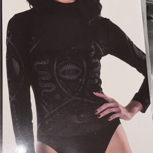 Sheer Dark Fortune
Bodysuit. NIP L/XL